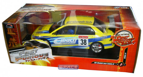 1:18 Scale 2002 Mitsubishi Lancer Evo. VII yellow (The Fast ...)